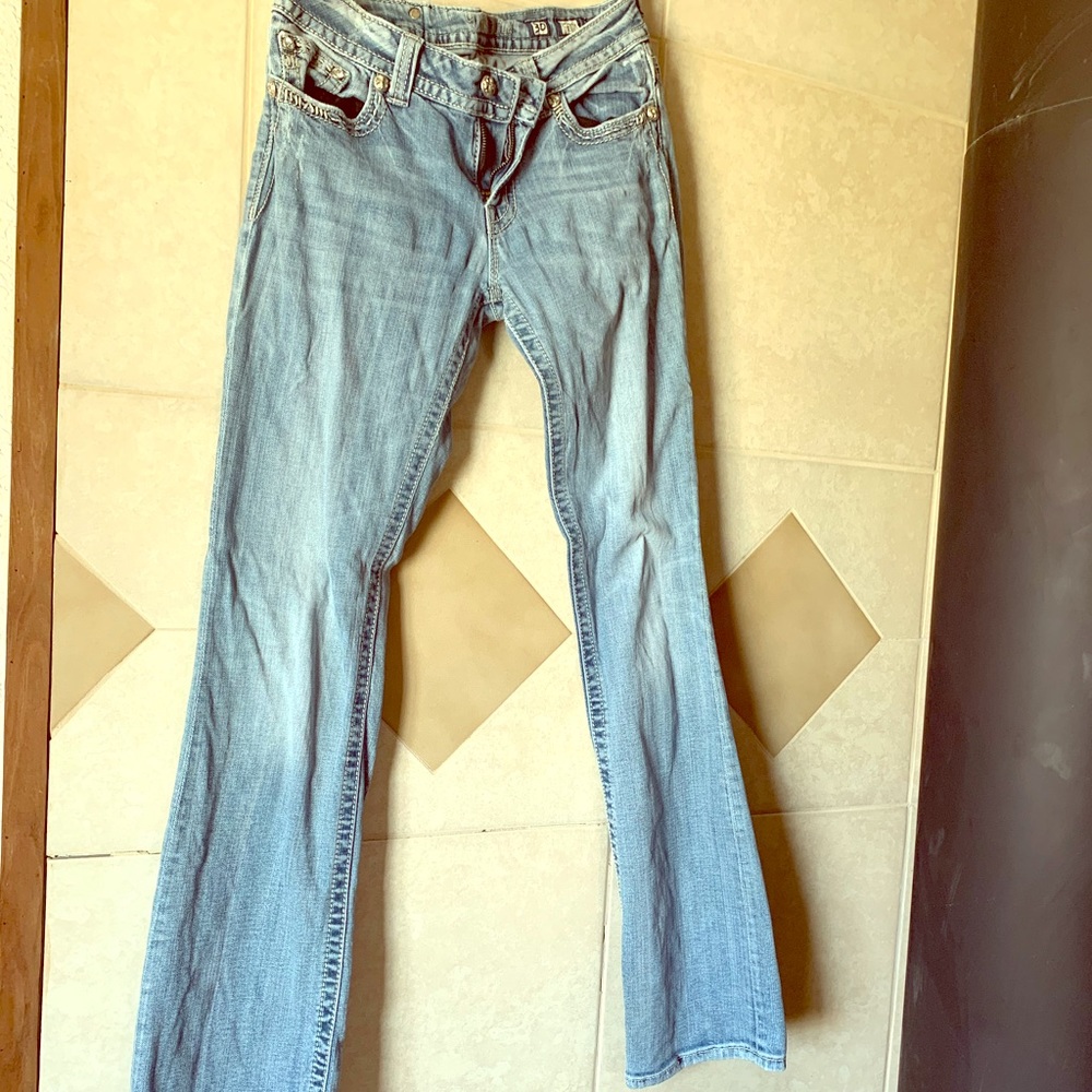 Woman’s miss me jeans.